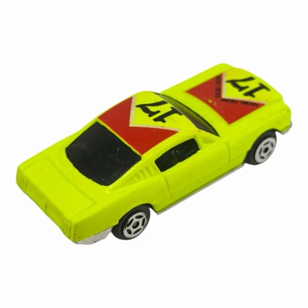 Vintage Yellow Diecast Toy Car with Racing Decals‎